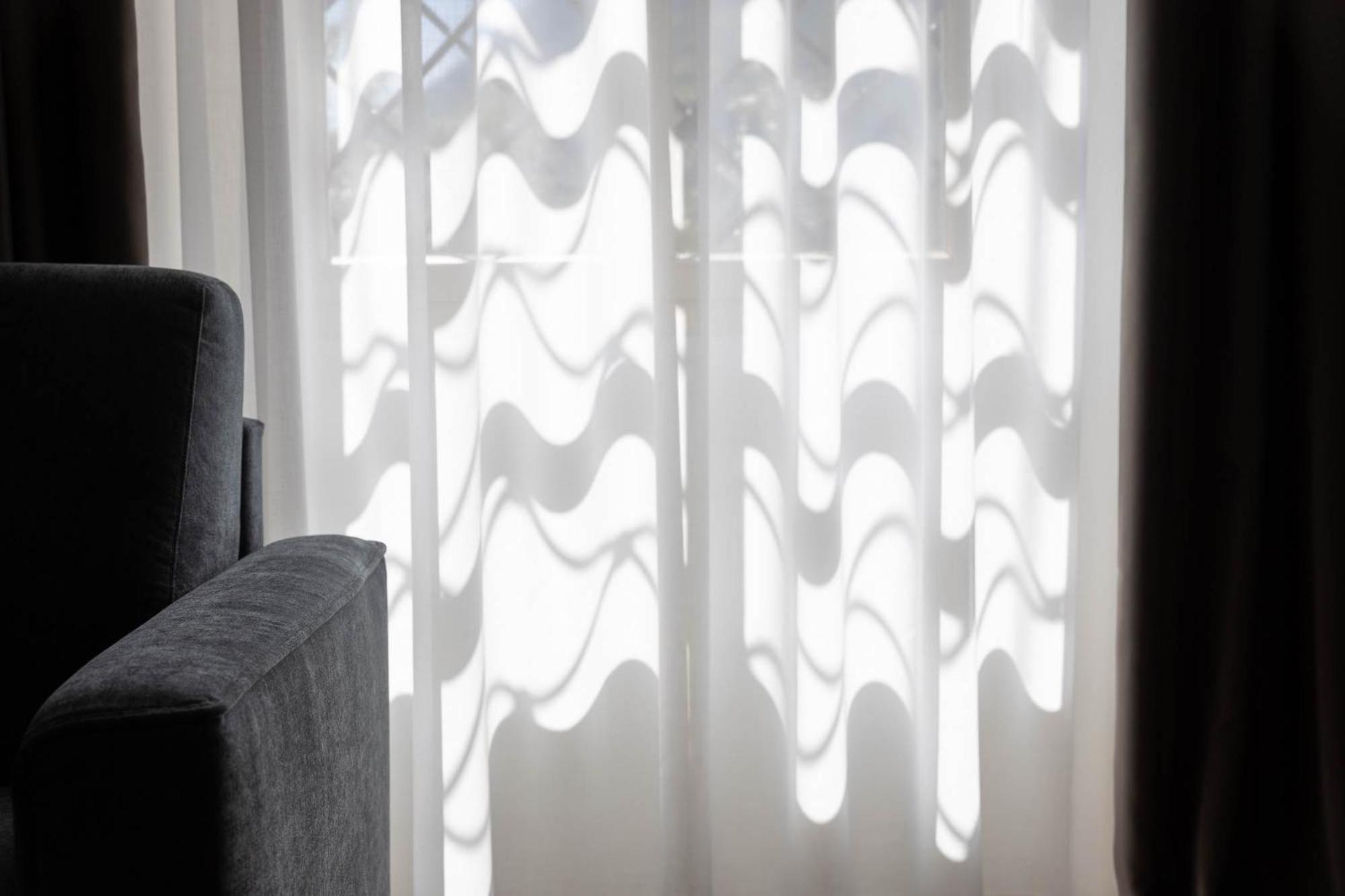 Ansitz Battisti Suites (Adults Only) カルダーロ 部屋 写真